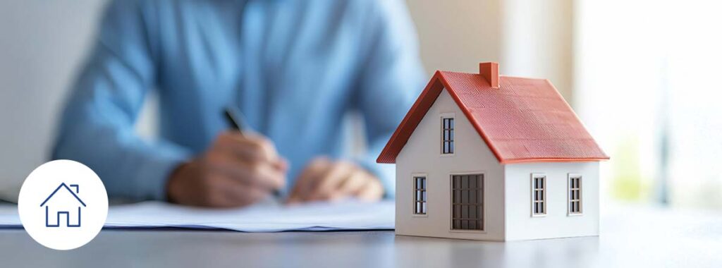 Person reviewing a homeowners insurance policy to avoid common mistakes