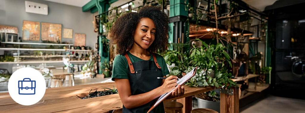 Florida Business Owner Reviewing Liability Insurance Documents in Office – Professional Setting Highlighting Trust and Protection with Florida General Liability Insurance Coverage.