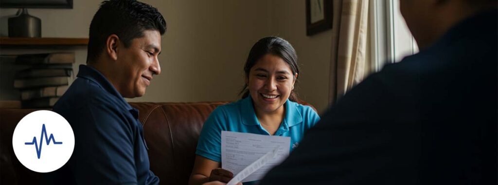 Smiling Latino reviewing insurance documents in the United States, realistic image about immigrant insurance in 2025 with royal blue detail.