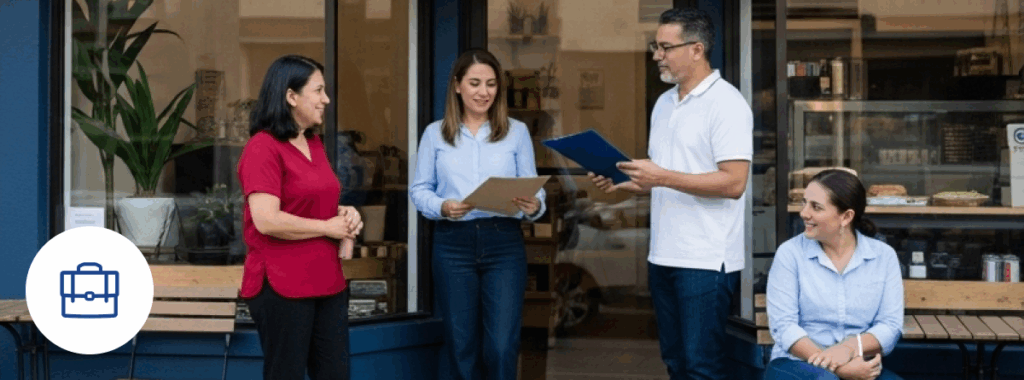 Affordable commercial insurance Florida for Hispanic small business owners storefront scene.