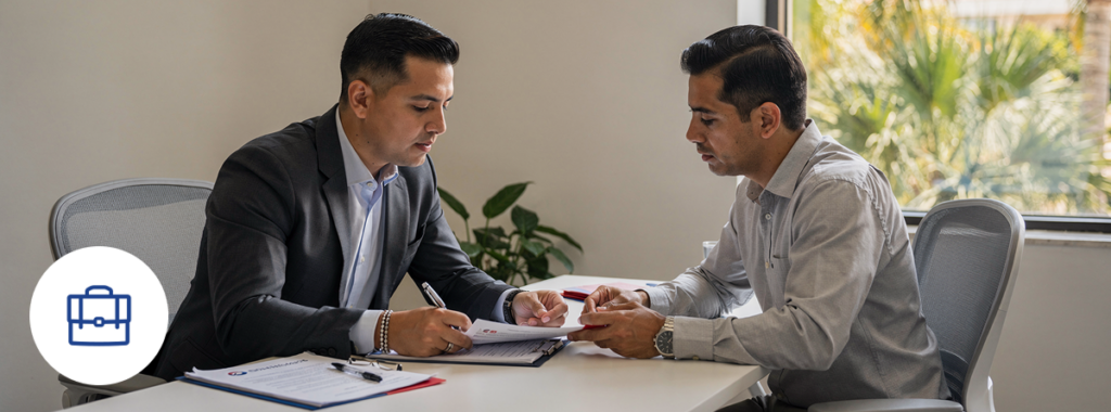 Advisor reviews commercial insurance audit in Florida with local business owner