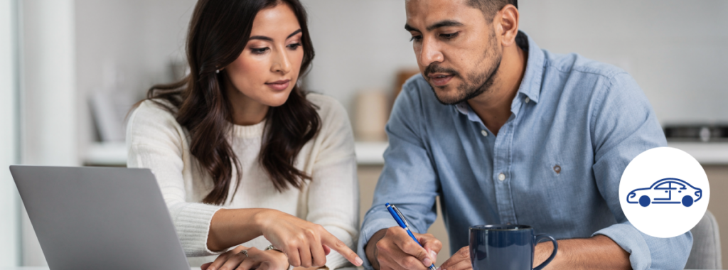 Latino couple reviews how to compare auto insurance companies at home