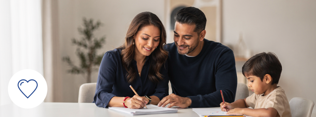 Latin family reviewing best life insurance policy while child draws at home
