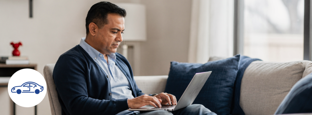 Latin adult reviewing online insurance quotes Texas on laptop at home